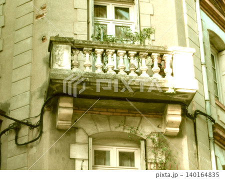 stylish balcony with a metal railing stylish balcony with a metal railing 140164835