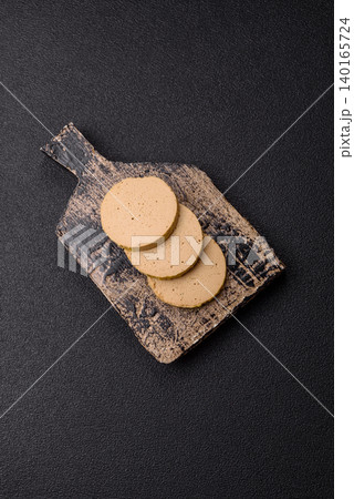 Foie gras, sliced chicken liver with fruit jam for French toast. Foie gras Foie gras, sliced chicken liver with fruit jam for French toast. Foie gras 140165724