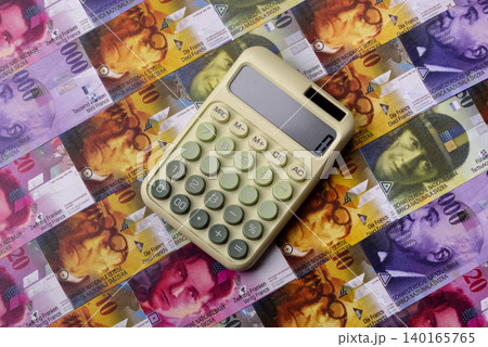 Switzerland, Swiss franc paper money and coins, financing and commodity exchange. Swiss currency Switzerland, Swiss franc paper money and coins, financing and commodity exchange. Swiss currency 140165765