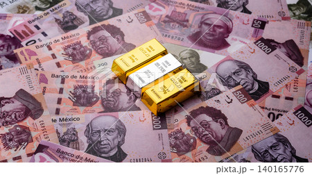 Gold and silver bullion or ingots as metals for bank storage, investments. Gold and silver bars Gold and silver bullion or ingots as metals for bank storage, investments. Gold and silver bars 140165776