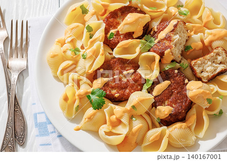 Shell Pasta And Meat Patties on a Plate Shell Pasta And Meat Patties on a Plate 140167001