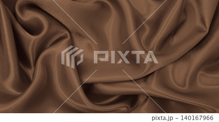 Smooth elegant brown silk or satin luxury cloth texture as abstract background. Luxurious background design.  In Sepia toned. Retro style 140167966