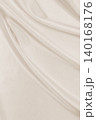Smooth elegant golden silk or satin luxury cloth texture as wedding background. Luxurious background design. In Sepia toned. Retro style 140168176