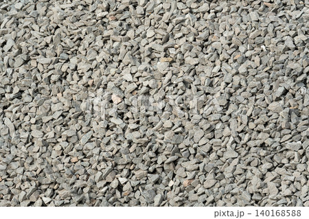 Construction gravel pattern, crushed grey stone textured background Construction gravel pattern, crushed grey stone textured background 140168588