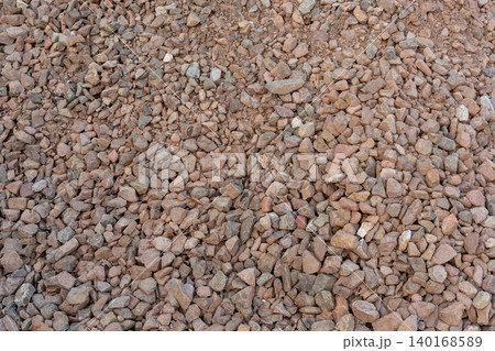 Construction gravel pattern, crushed grey stone textured background Construction gravel pattern, crushed grey stone textured background 140168589