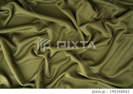 Sport cloth fabric texture background, olive green soccer shirt pattern Sport cloth fabric texture background, olive green soccer shirt pattern 140168681