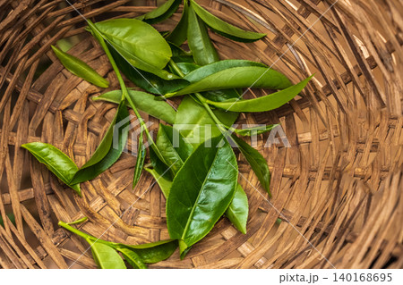 Young green tea leaves at the bottom of the basket 140168695