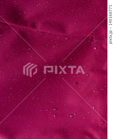 Waterproof fabric texture with rain drops closeup 140168771