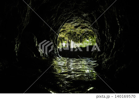 View from Inside Mossy Cave Toward the Entrance. View from Inside Mossy Cave Toward the Entrance. 140169570