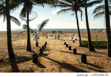 A path from the hotel to the ocean among palm trees on Negombo beach, editorial image A path from the hotel to the ocean among palm trees on Negombo beach, editorial image 140169670