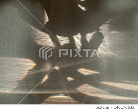 Abstract composition of a sunset light caustic effect and two glass vases. 140170632