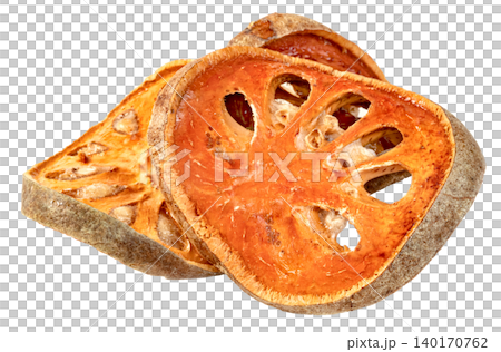 Dried bael fruit slices isolated. Aegle marmelos herbal tea ingredient known for medicinal properties and health benefits. Macro shot showing texture and seeds of wood apple. Dried bael fruit slices isolated. Aegle marmelos herbal tea ingredient known for medicinal properties and health benefits. Macro shot showing texture and seeds of wood apple. 140170762