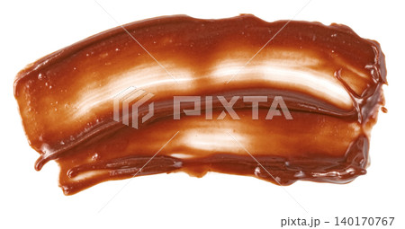 Smear of glossy chocolate or hazelnut spread isolated. Professional top view of a rich brown creamy texture stroke. Perfect for bakery, dessert, and food packaging design. Smear of glossy chocolate or hazelnut spread isolated. Professional top view of a rich brown creamy texture stroke. Perfect for bakery, dessert, and food packaging design. 140170767