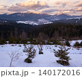 Winter evening sunset mountains (Ukraine, Carpathians -  mountain peaks Khomyak and Synyak scenery view from Yablunytsia Pass). 140172016