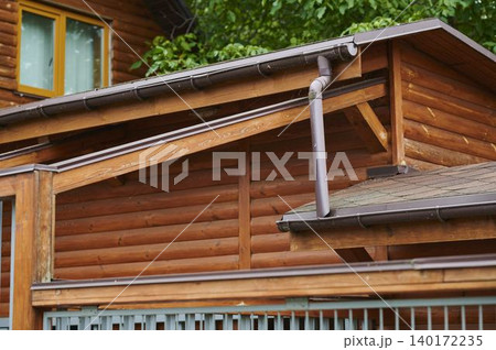 Beautiful wooden architecture showcasing craftsmanship in a serene forest setting 140172235