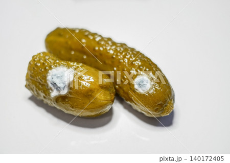 Spoiled Pickles with Mold. Concept of food spoilage, hygiene, and fermentation process Spoiled Pickles with Mold. Concept of food spoilage, hygiene, and fermentation process 140172405