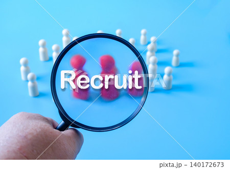 Wooden figures on magnifying glass,Recruitment employee concept. 140172673