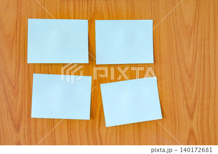 Sticky paper note on wooden wall. Sticky paper note on wooden wall. 140172681