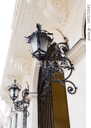 Wrought iron lanterns light historic entry 140172841