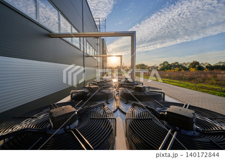 Cooling system glimmers in the golden sunset light Cooling system glimmers in the golden sunset light 140172844