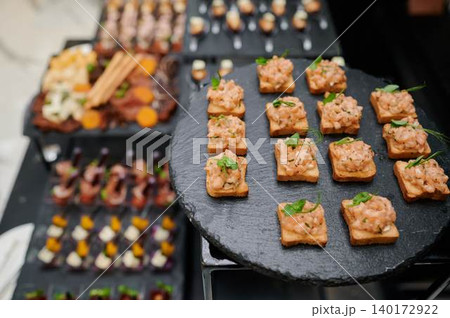 Yummy bites on a chic platter Yummy bites on a chic platter 140172922