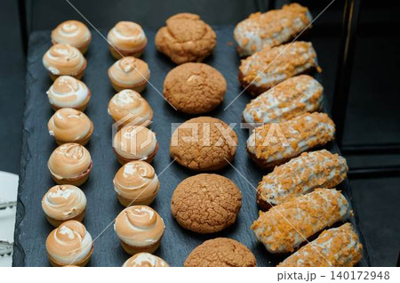 Delightful desserts on a charming display Delightful desserts on a charming display 140172948