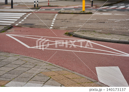 Streets of Amsterdam Display the Vibrant Design of Bike Paths Among Charming City Architecture Streets of Amsterdam Display the Vibrant Design of Bike Paths Among Charming City Architecture 140173137