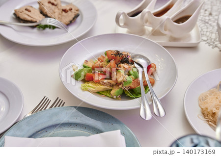 Fresh salad delight served at elegant dining table 140173169