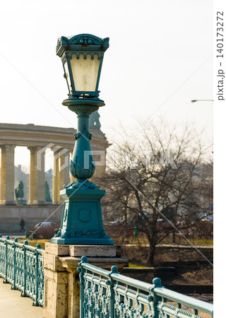 Vintage lamp post on a sunny riverside stroll Vintage lamp post on a sunny riverside stroll 140173272