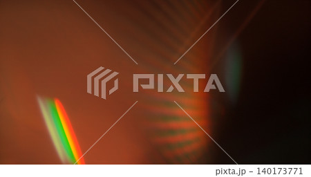 Abstract RGB prism lens flare with colorful light refraction and optical distortion. Creative cinematic background suitable for visual effects, overlays and modern digital design. 140173771