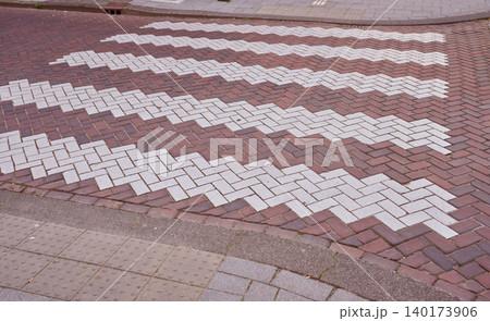 Waves of Design in Amsterdam's City Center With Artistic Crosswalk Patterns in Vibrant Brickwork 140173906