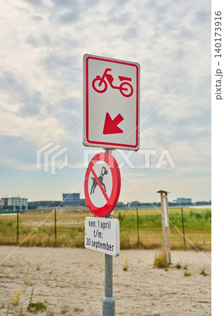 Motorbike Lane in the Heart of Amsterdam Showcasing Vibrant City Life and Picturesque Surroundings in Late September Motorbike Lane in the Heart of Amsterdam Showcasing Vibrant City Life and Picturesque Surroundings in Late September 140173916