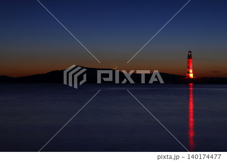 Lighthouse and newmoon Lighthouse and newmoon 140174477