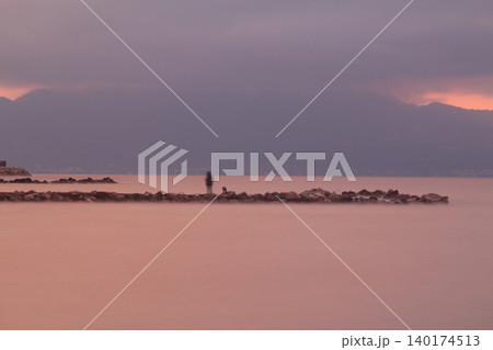 sunset on the beach. Seaside town of Turgutreis and spectacular sunsets. Selective Focus. Long Exposure shoot. tranquility scene. sunset on the beach. Seaside town of Turgutreis and spectacular sunsets. Selective Focus. Long Exposure shoot. tranquility scene. 140174513