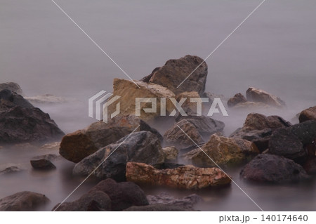 sunset on the beach. Seaside town of Turgutreis and spectacular sunsets. Selective Focus. Long Exposure shoot. tranquility scene. 140174640