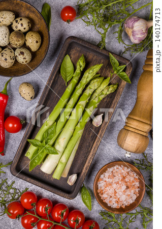 Fresh green asparagus, quail eggs, and cherry tomatoes 140174713