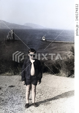 Young boy overlooking the Black Sea near Gurzuf during a family trip in Crimea in 1971 140174812