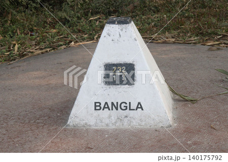 concrete boundary pillar marking the international border concrete boundary pillar marking the international border 140175792