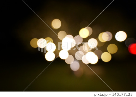 Abstract Red yellow Bokeh Lights Background in Urban Night Scene 140177123