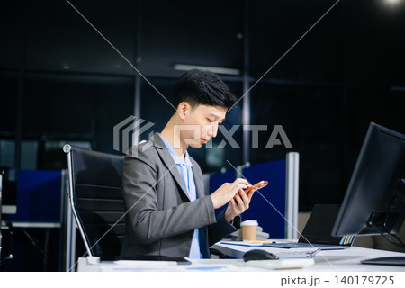 business man executive manager looking at laptop watching online webinar training or having virtual meeting video conference business man executive manager looking at laptop watching online webinar training or having virtual meeting video conference 140179725