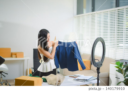 Small business entrepreneur SME freelance woman working at home office, BOX,tablet and laptop online, marketing Small business entrepreneur SME freelance woman working at home office, BOX,tablet and laptop online, marketing 140179910