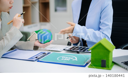 Business team working virtual modern smartphone to reduce CO2 emissions carbon footprint climate change to limit global warming 140180441