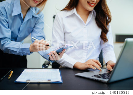Team work process. Photo young business crew working with new startup project. Project managers meeting. Analyze plans, papers in office Team work process. Photo young business crew working with new startup project. Project managers meeting. Analyze plans, papers in office 140180515