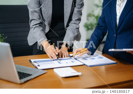 Business team collaboration discussing working analyzing with financial data and marketing growth report graph in team, presentation and digital tablet, laptop 140180817