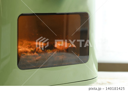 Cooking oyster mushrooms in the air fryer for a quick and easy meal preparation at home Cooking oyster mushrooms in the air fryer for a quick and easy meal preparation at home 140181425