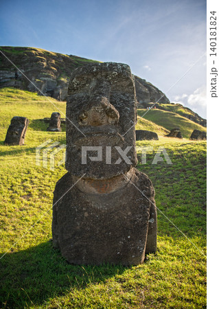 Serene ancient moai statue carved from stone on easter island chile Serene ancient moai statue carved from stone on easter island chile 140181824