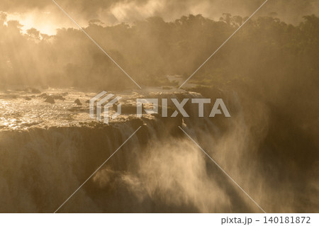Feel profound awe watching dramatic iguazu falls flow with heavy mist Feel profound awe watching dramatic iguazu falls flow with heavy mist 140181872