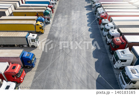 Aerial view of a large truck parking lot at a logistics hub, wit 140183165