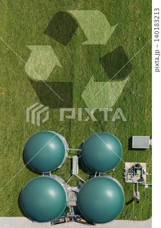 Renewable natural gas plant with recycling symbol. Decarbonization and carbon neutrality concept Renewable natural gas plant with recycling symbol. Decarbonization and carbon neutrality concept 140183213
