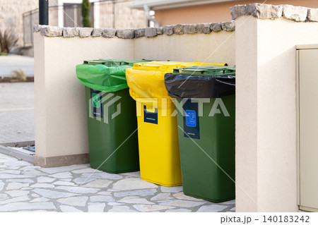 Bins for separate collection of garbage. Bins for separate collection of garbage. 140183242